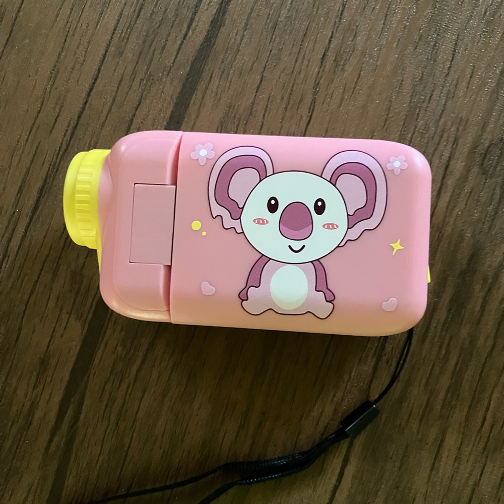Kids lil camcorder with sack to keep it in.